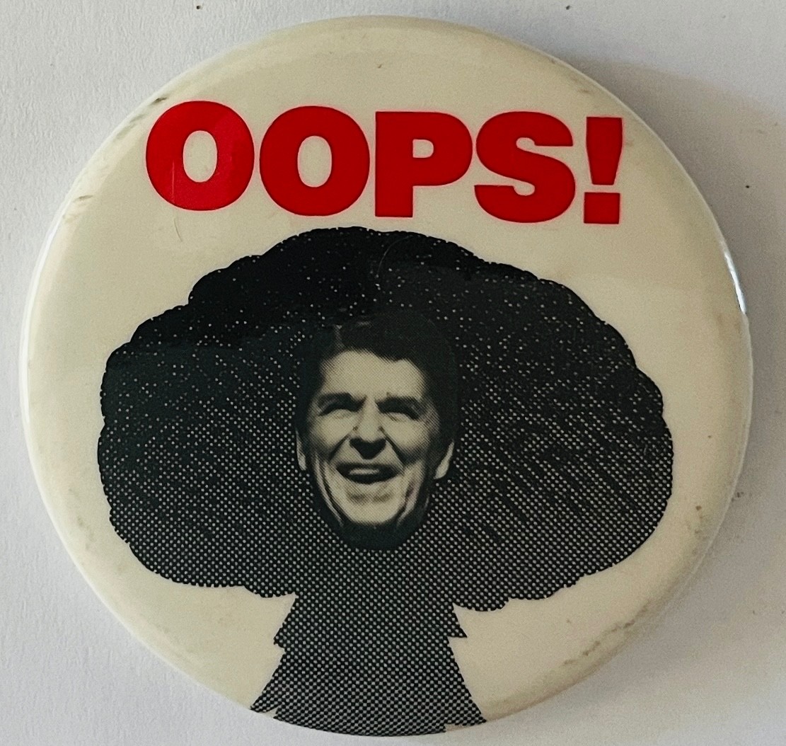 Anti Ronald Reagan button OOPS! Nuclear War? Peace protest cause pin back