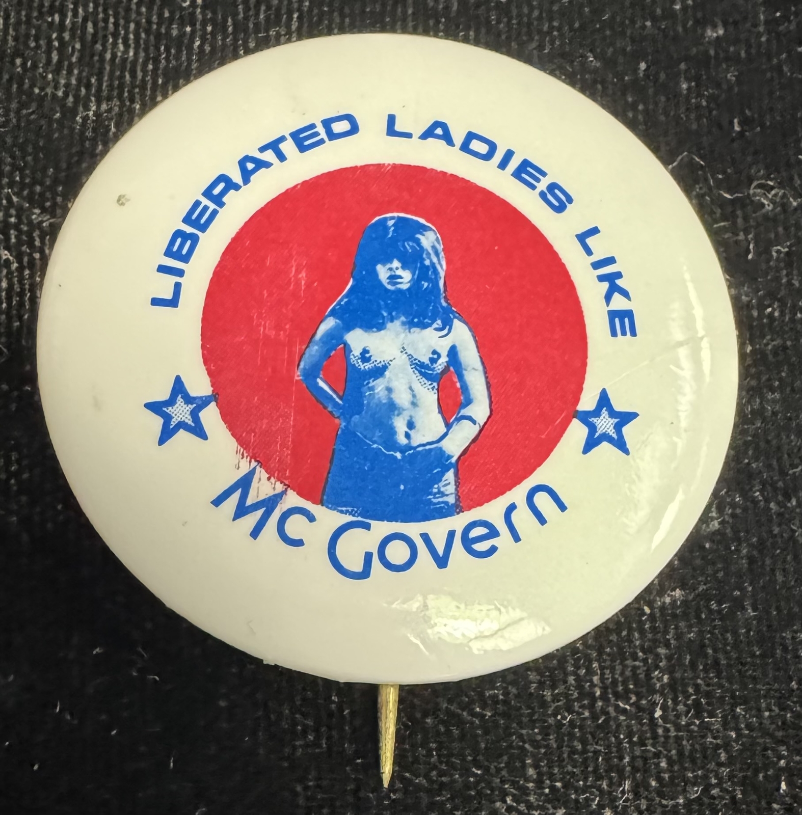 1972 MCGOVERN, 1 1/2″ CELLO BUTTON-LIBERATED LADIES LIKE, TOPLESS GIRL-RARE/MINT