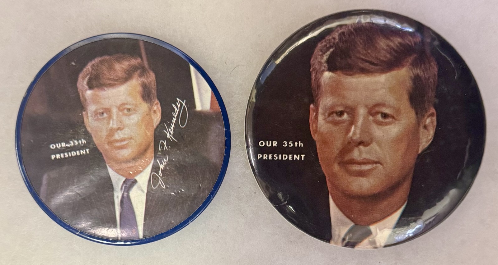 1961 JOHN F. KENNEDY INAUGURAL BUTTON PAIR, 3″ & 3 1/2″-GENERALLY EXCELLENT!