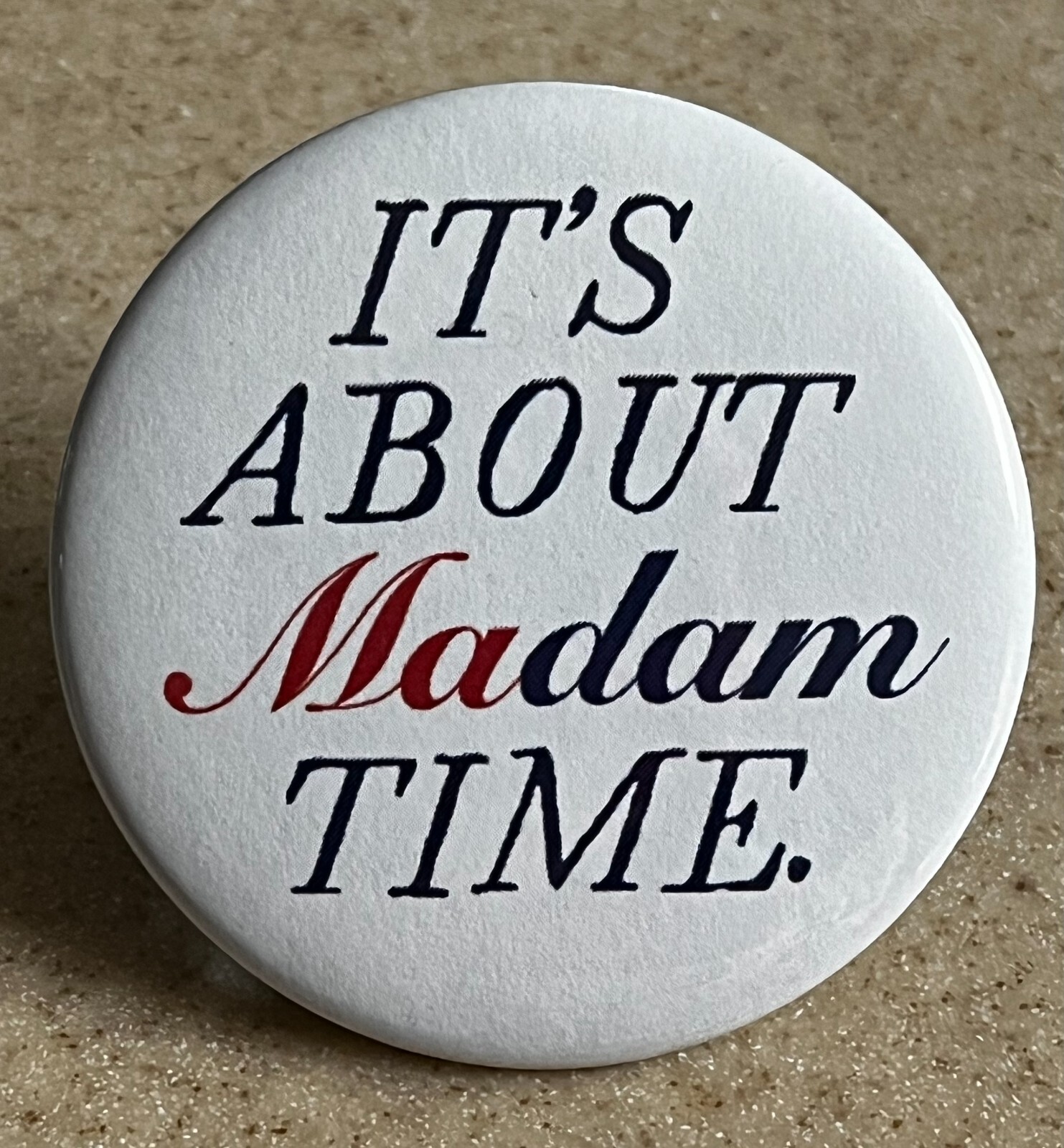 Campaign Pin-Back Button , 2 1/4 inch “IT’s ABOUT MADAM TIME.”