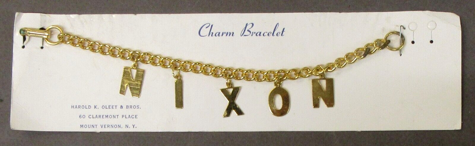1960’s NIXON gold-tone charm bracelet president mint on card fb