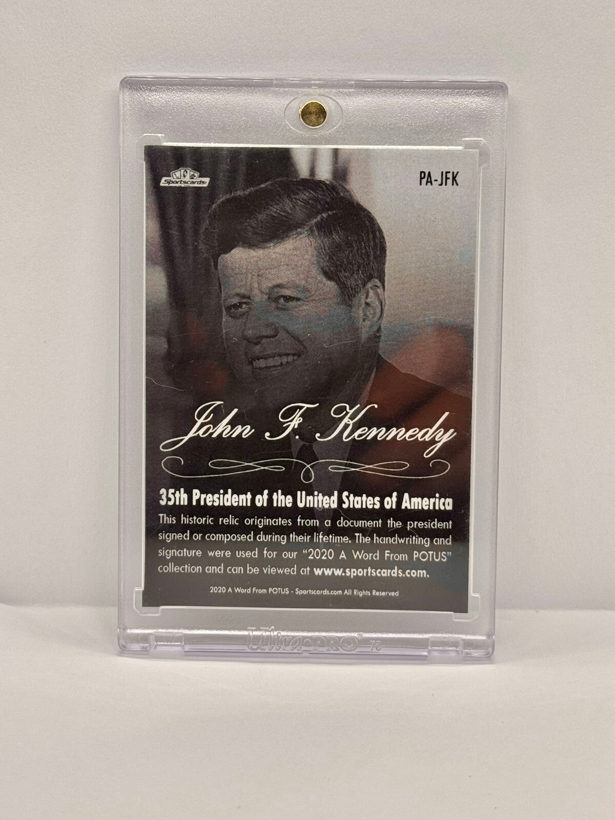 John F. Kennedy 2020 Word from POTUS relic piece handled by USA President Card