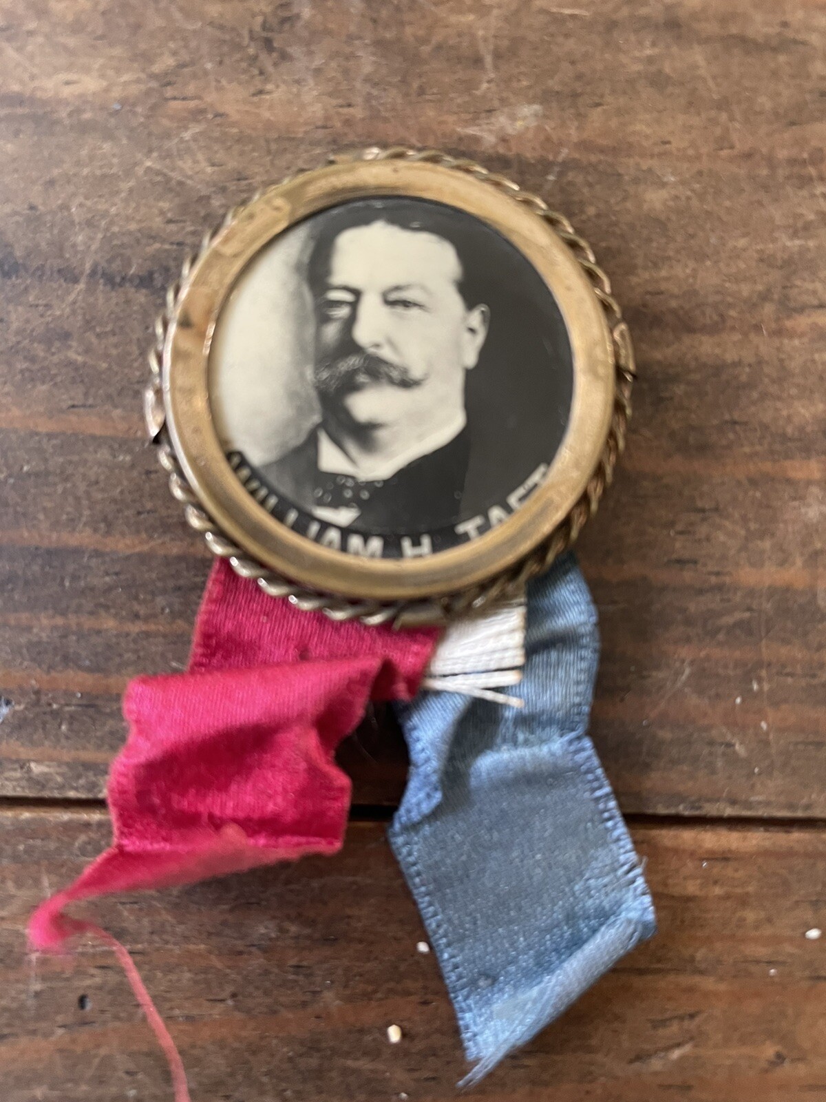 extremely rare ￼William Taft Metaled border pin back button with ribbons￼￼