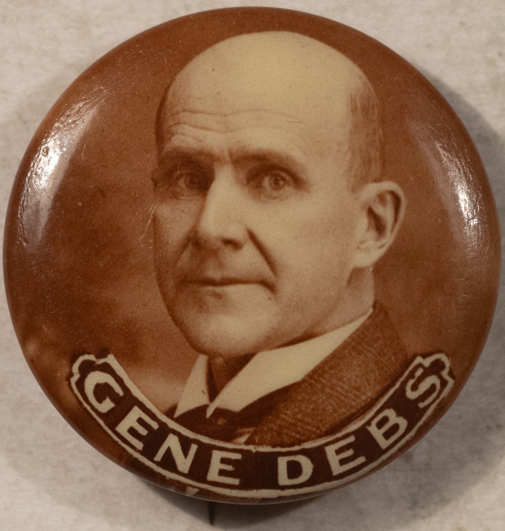 1904 OR 1908 EUGENE DEBS 7/8″ PICTORIAL SEPIA CAMPAIGN BUTTON-VERY RARE & MINT!