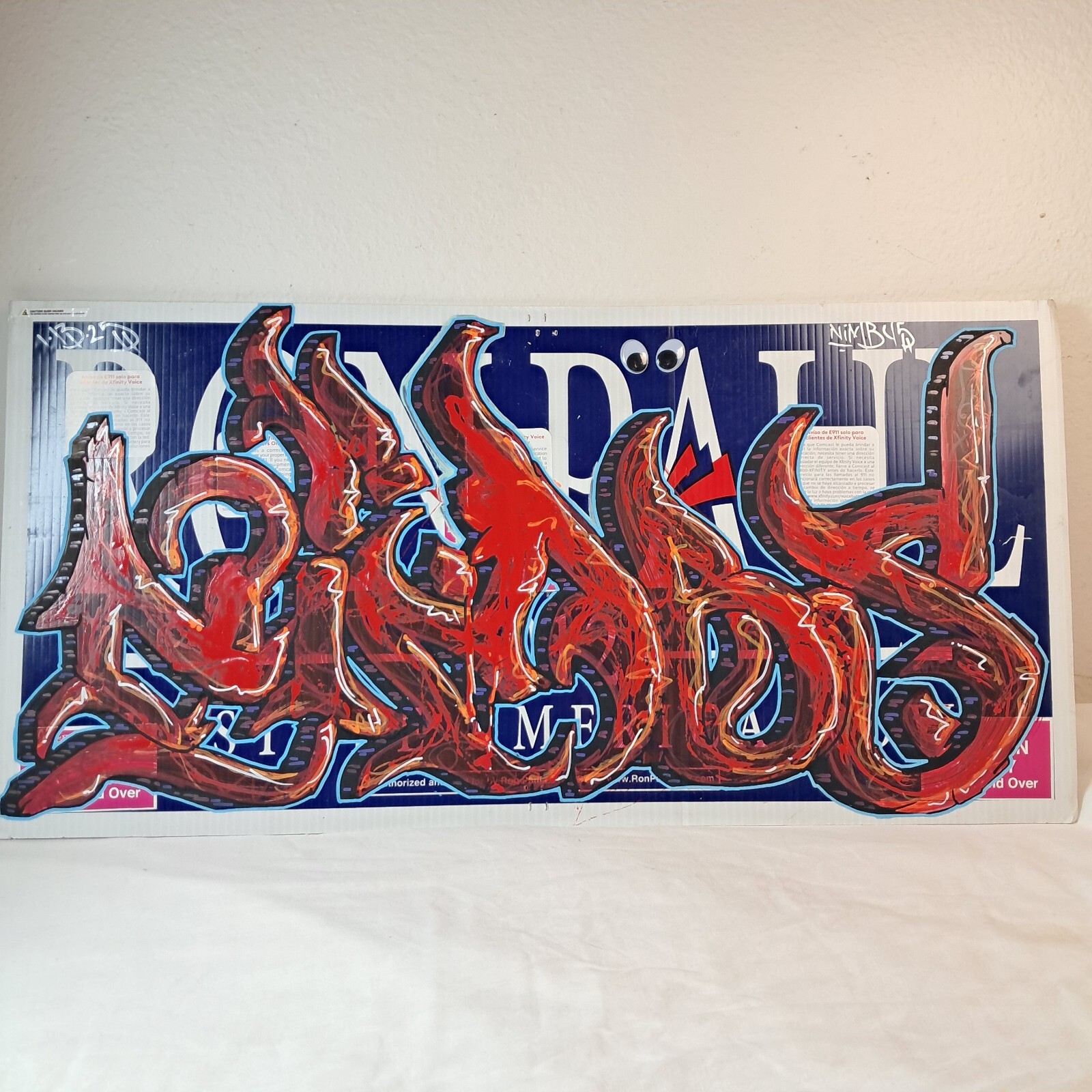 Graffiti Painting on Ron Paul Campaign Poster Sign – Restore America Now 2012