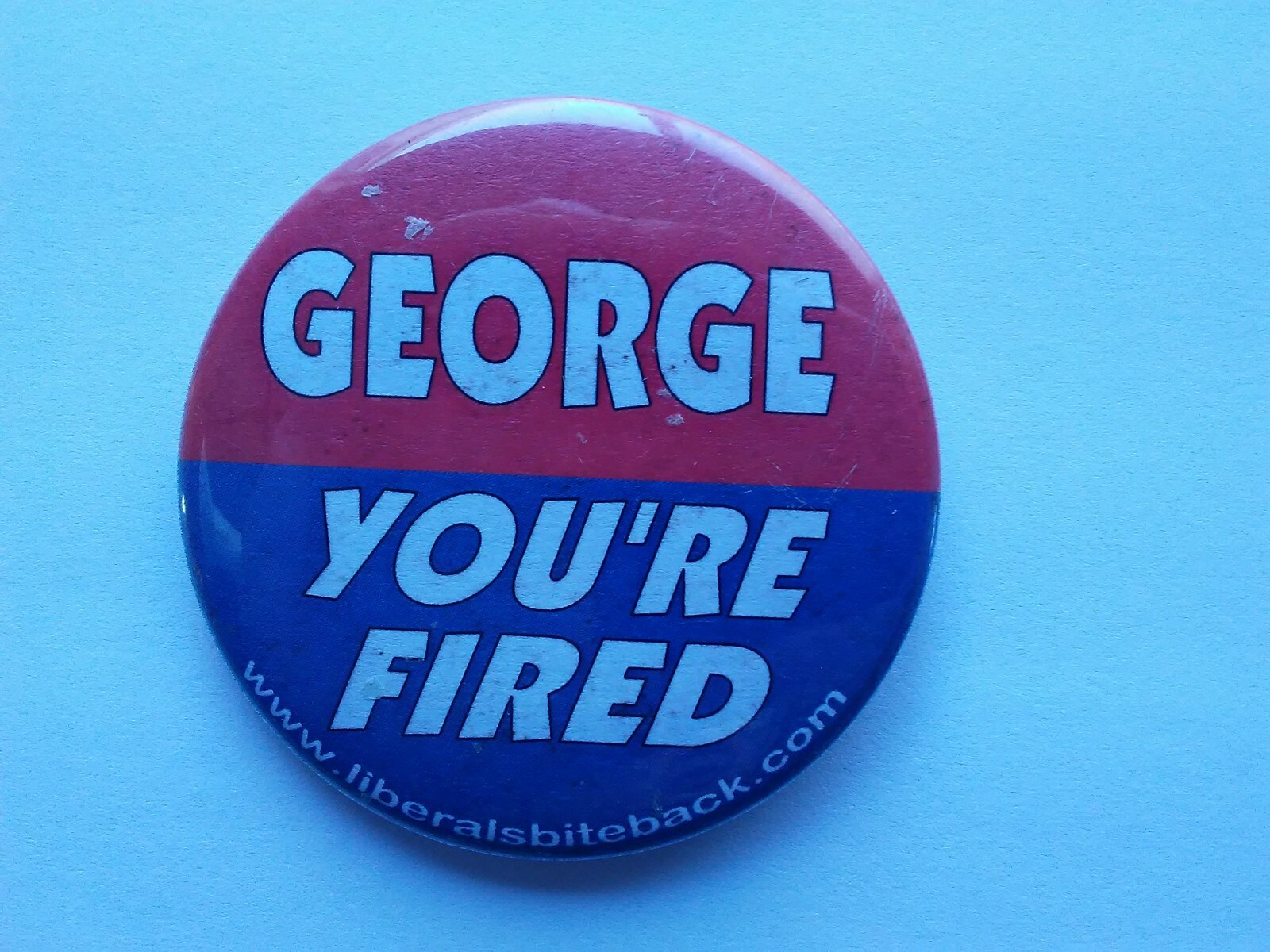 POLITICAL PIN (2004) “George (BUSH) You’re Fired” (Liberals Bite Back)