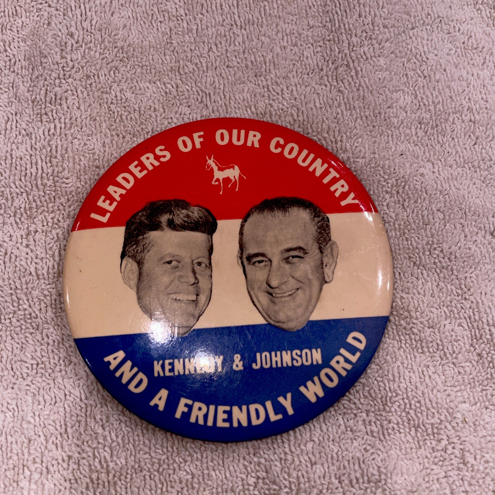 1960 KENNEDY-JOHNSON JUGATE “LEADERS OF OUR COUNTRY-FRIENDLY WORLD” BUTTON
