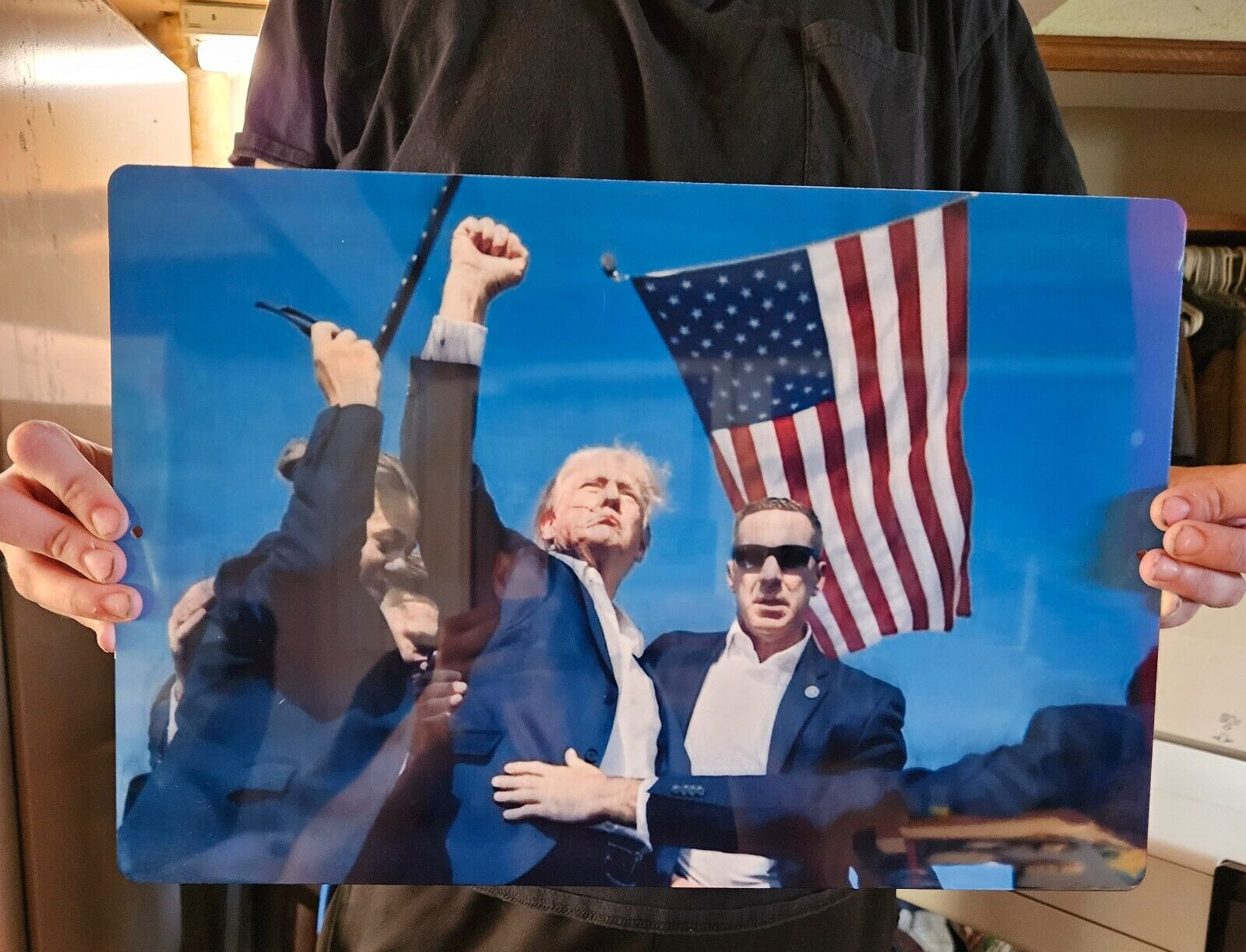 12×18 inch Iconic Trump assassination attempt metal poster.