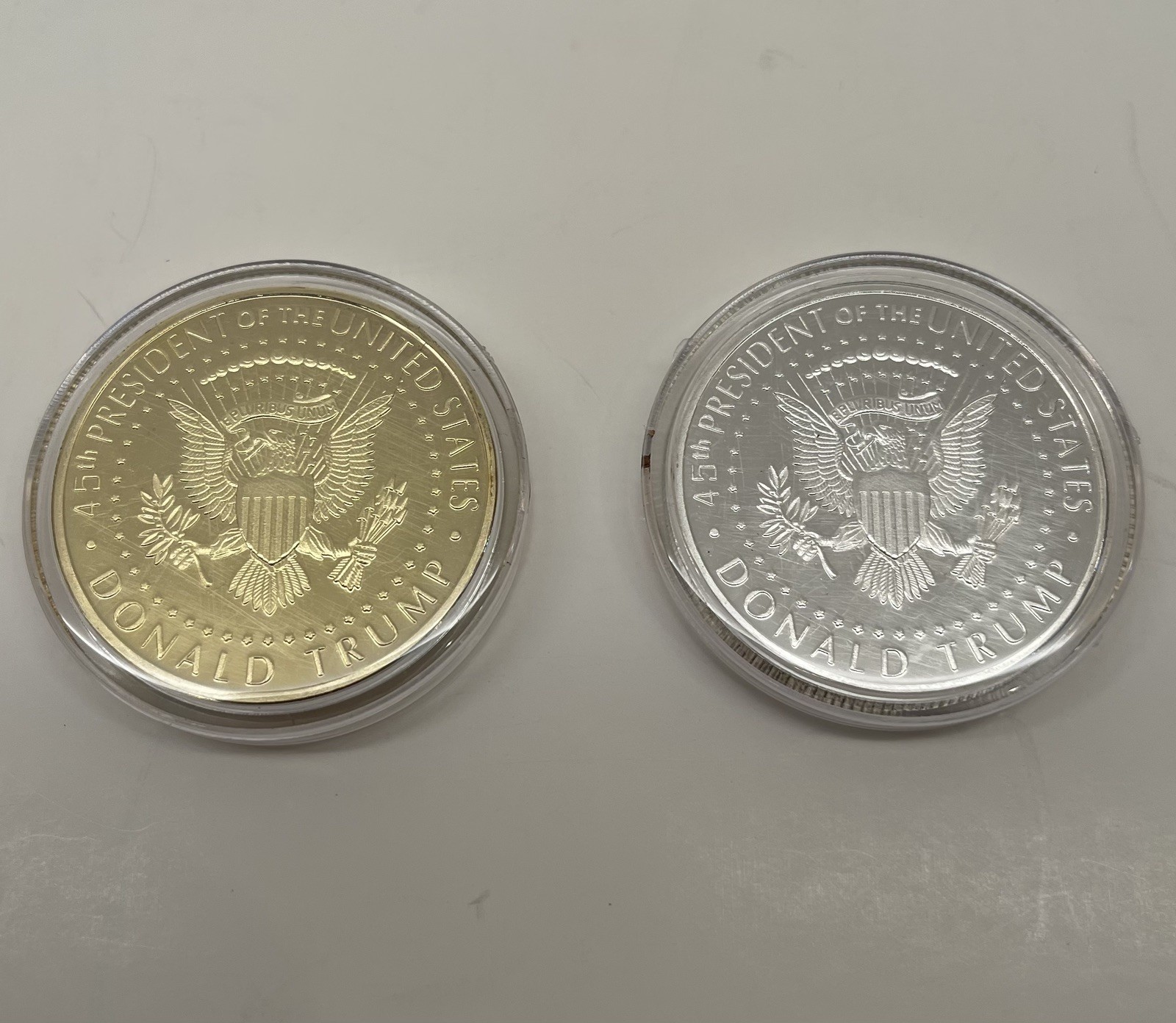 2019 Donald Trump Gold Plated and Silver Plated Two Coin Set in a hard capsule.