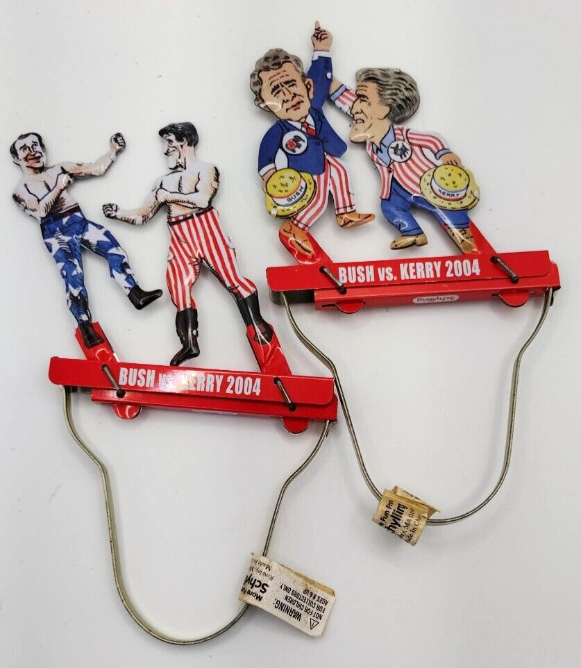 Lot of 2 Kerry vs Bush 2004 Political Tin Puppet Toy Hand Squeezers