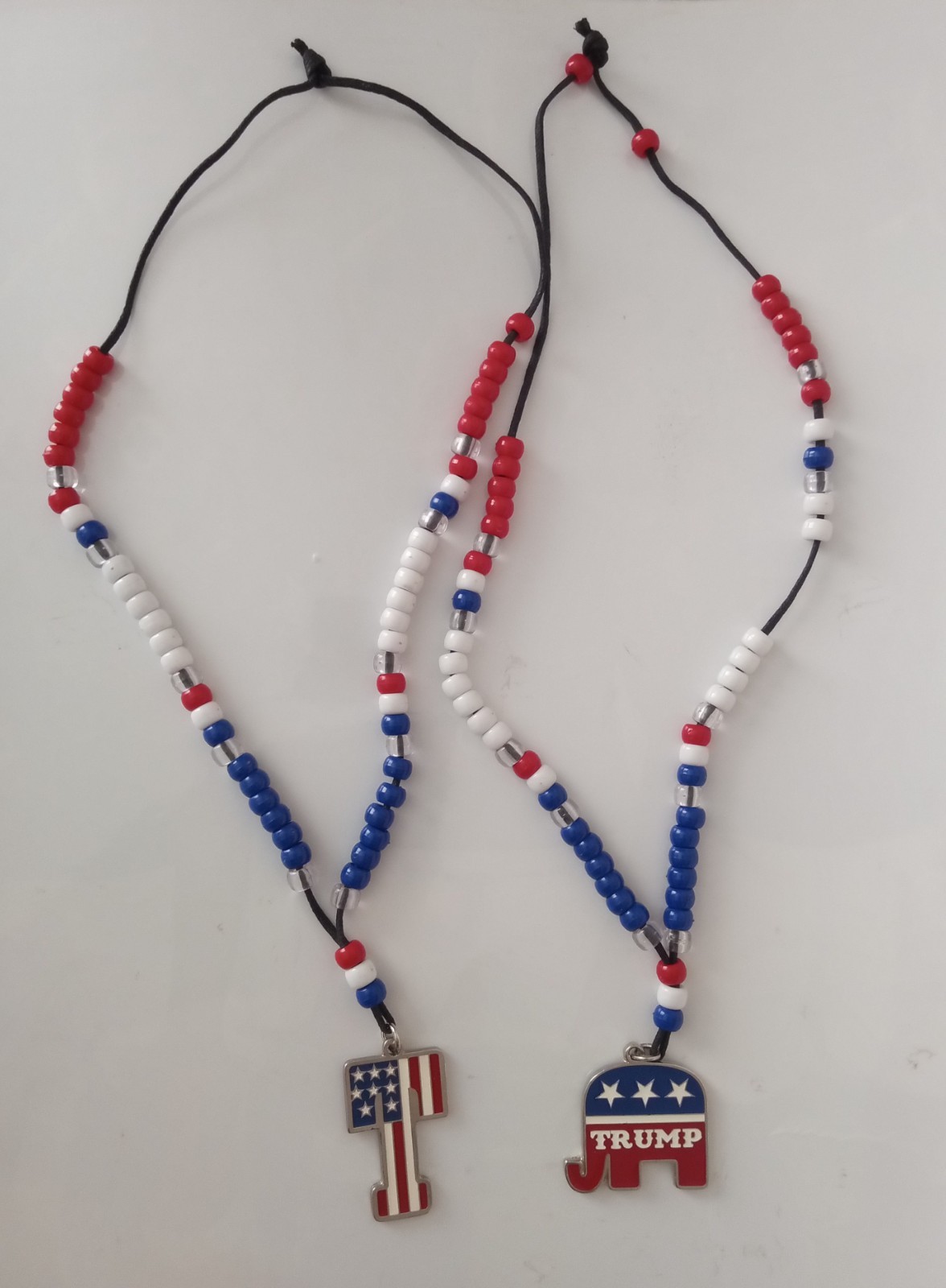2 TRUMP NECKLACES FOR $35