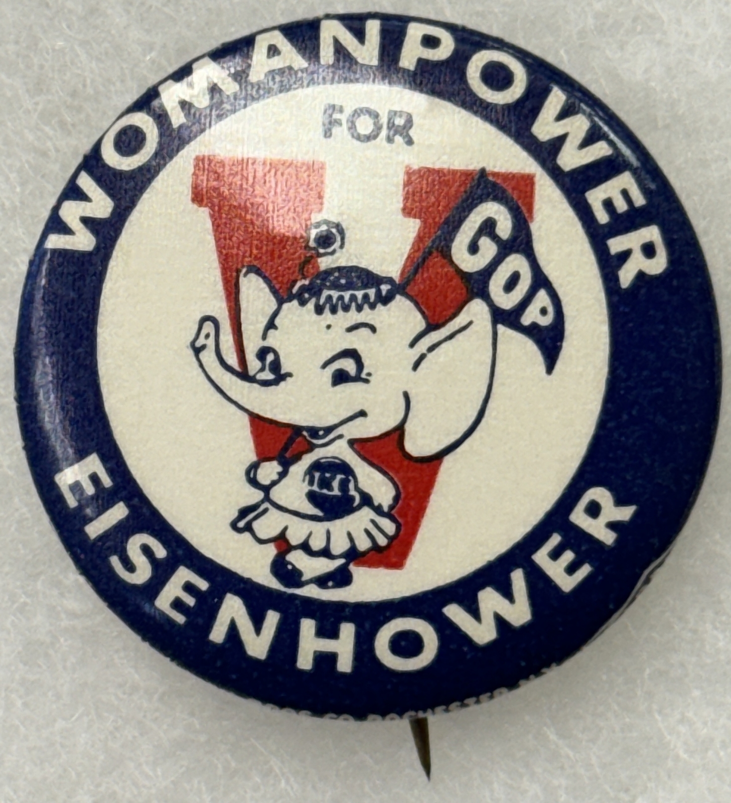 1952 EISENHOWER 1 1/2″ CELLO BUTTON, “WOMANPOWER FOR EISENHOWER” – RARE & MINT!
