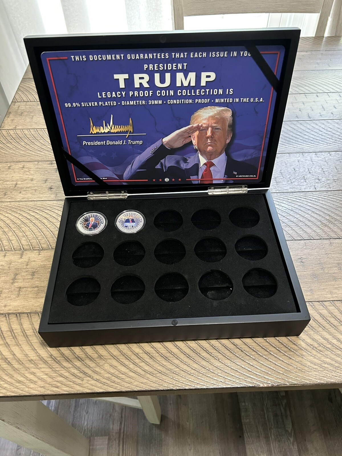 Two 2024 Donald J. Trump 99.9% Silver-Plated Proof Coins And 15 Coin Holder Case