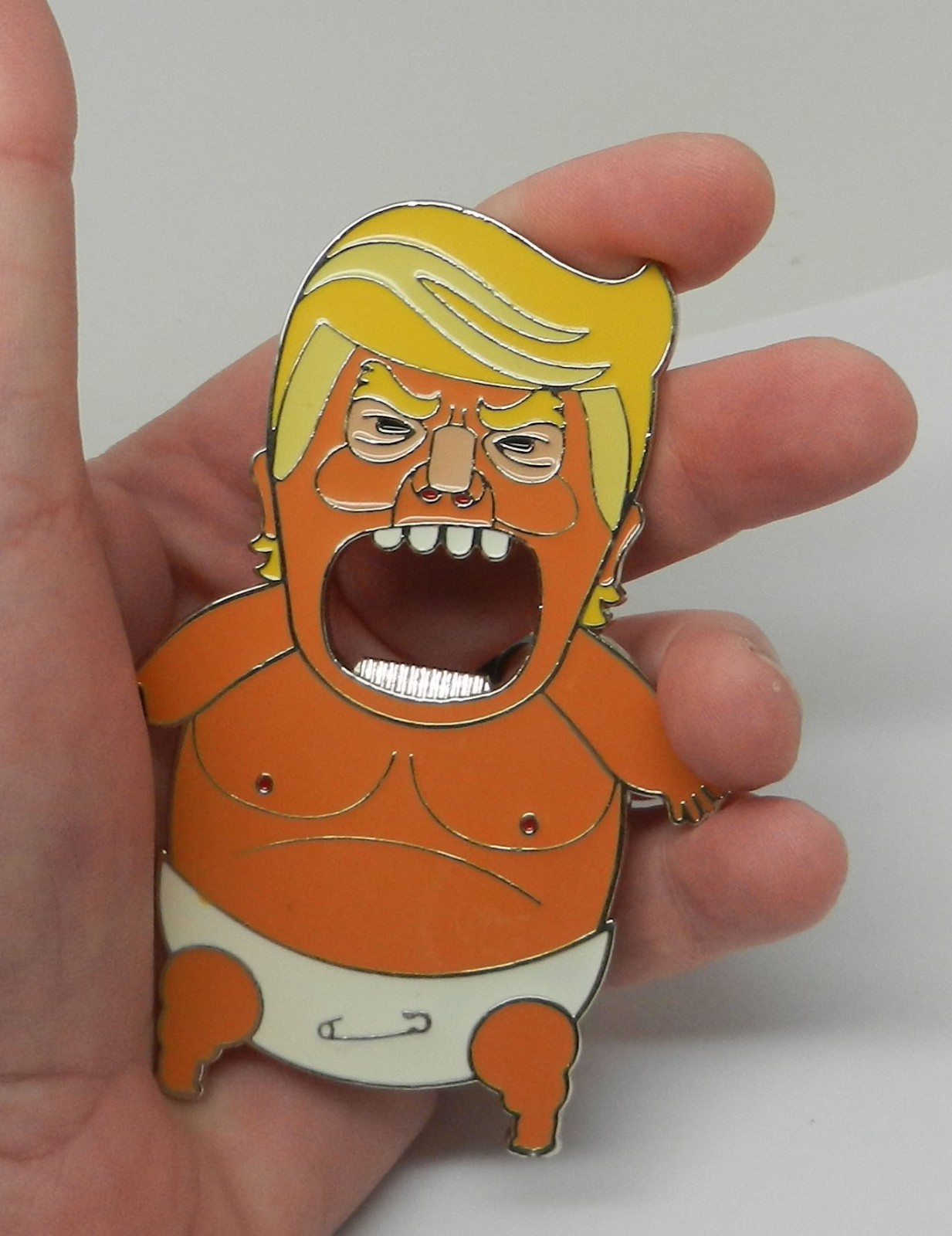 Anti Donald Trump “Baby Trump” in diaper magnetic metal & enamel bottle opener