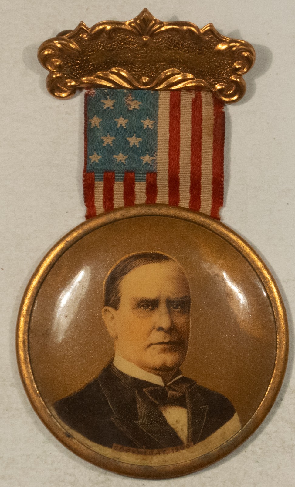1900 WM MCKINLEY 1 3/4″ CELLULOID PIN W/ SILK RIBBON, 3 1/4″ OVERALL – EXC+
