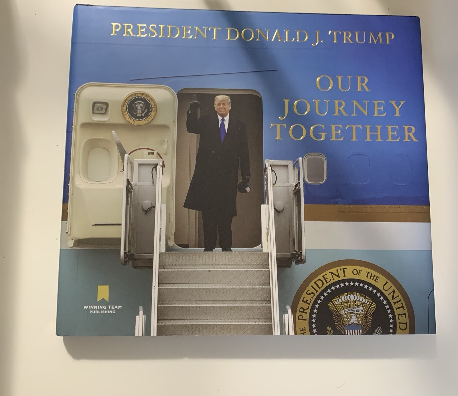 President Donald Trump Bundle Of Hats Flags And A Book