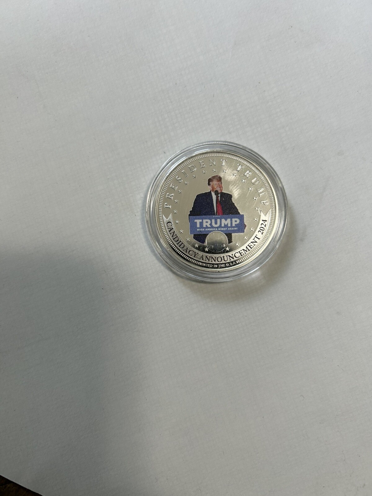 Two 2024 Donald J. Trump 99.9% Silver-Plated Proof Coins And 15 Coin Holder Case