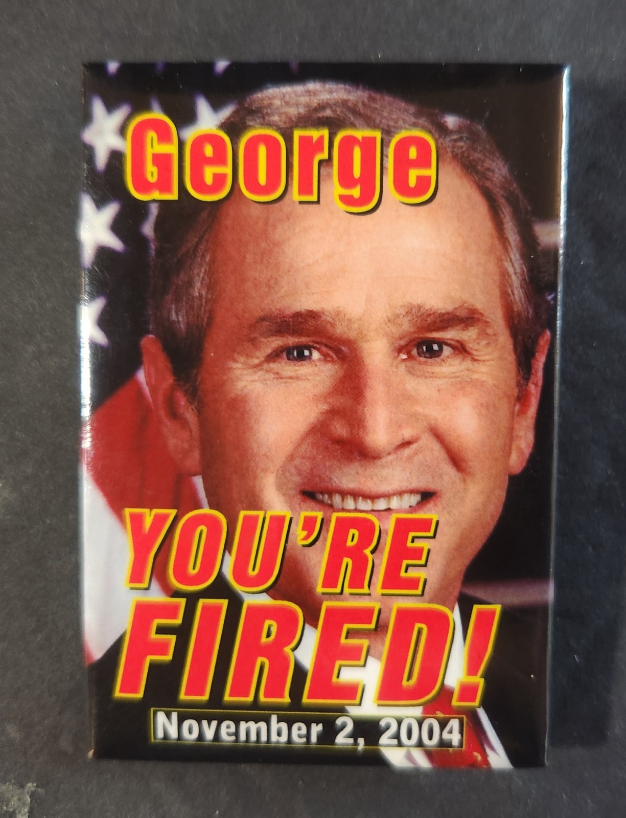 GEORGE W. BUSH GEORGE YOU’RE FIRED 2004 PRESIDENTIAL CAMPAIGN BUTTON PINBACK