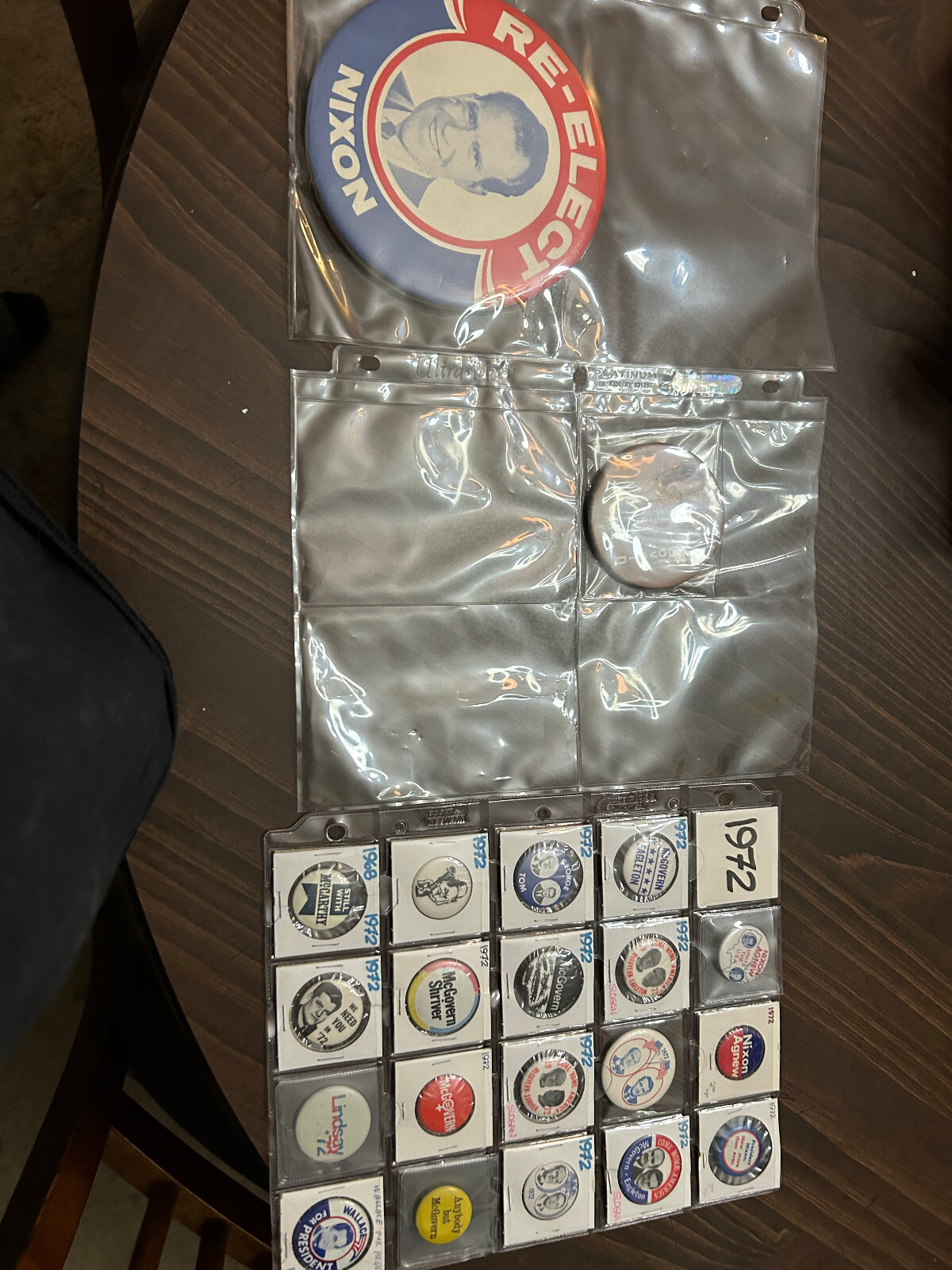Collection of 1968 and 1972 political pins: Nixon, McGovern, Wallace