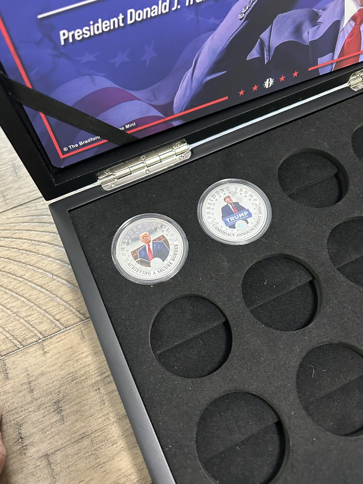 Two 2024 Donald J. Trump 99.9% Silver-Plated Proof Coins And 15 Coin Holder Case