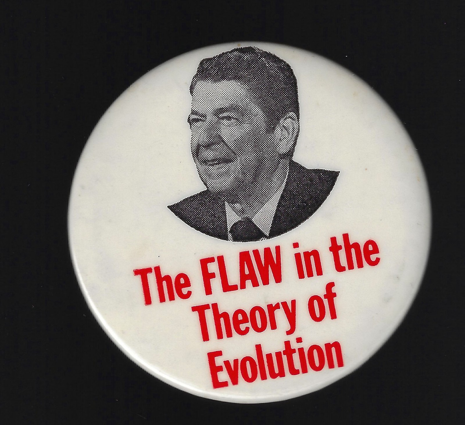 1980-’84 anti-Ronald Reagan Protest Campaign Pin Flaw in Theory of Evolution