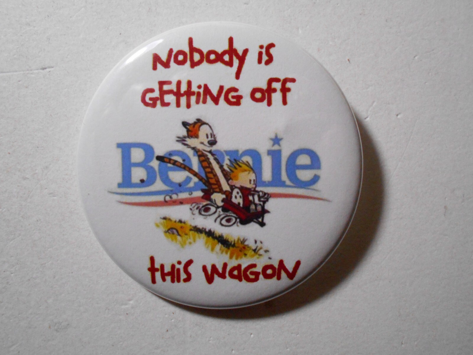 2-1/4″ 2016 Bernie Sanders-Calvin and Hobbes-Nobody is Getting off this Wagon