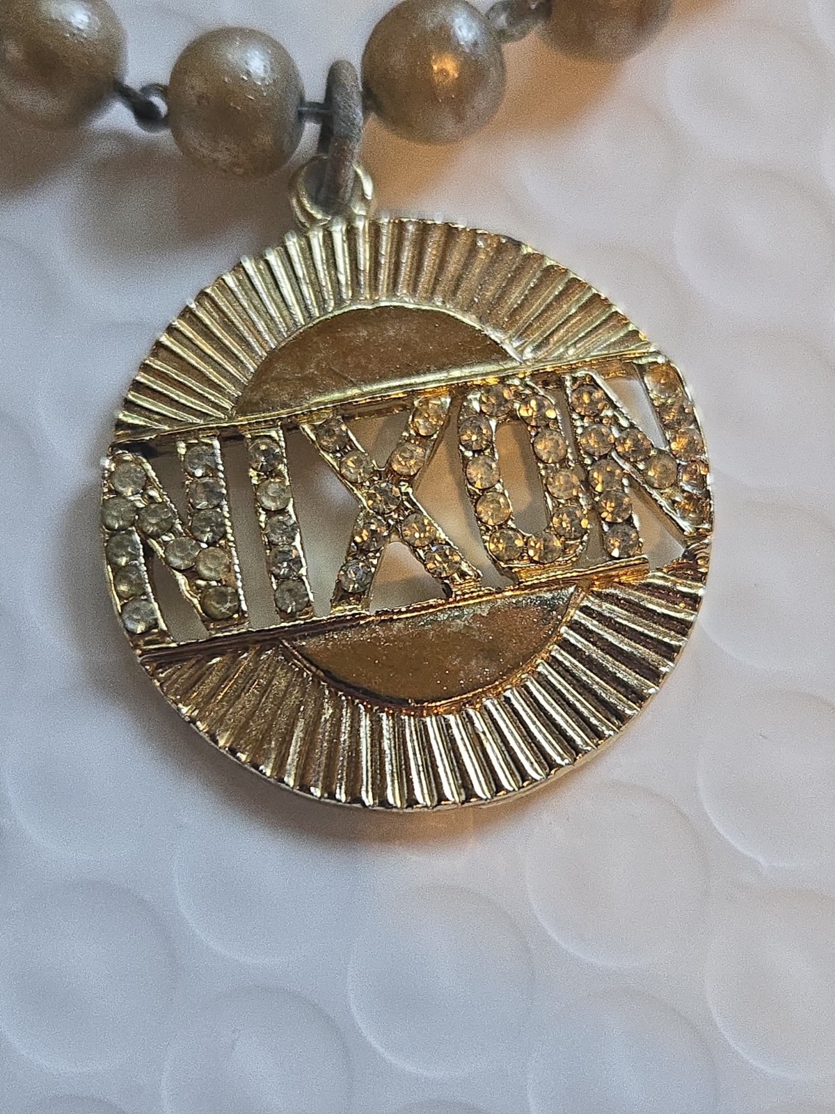 Vintage Nixon Goldtone Bracelet Pendant Charm